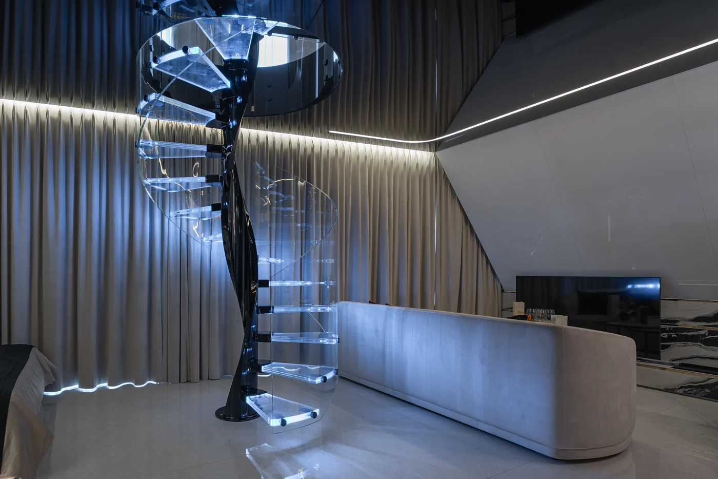 Illuminated spiral staircase in a contemporary interior